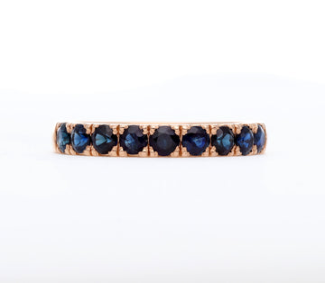 Raudono aukso žiedas mėlynais safyrais