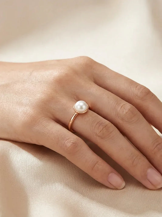 ožinio aukso žiedas su dideliu perlu