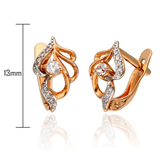 Smalki zelta auskari ar vienkāršu dizainu.