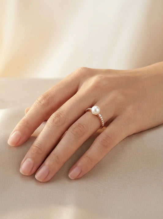 Auksinis žiedas su perlu