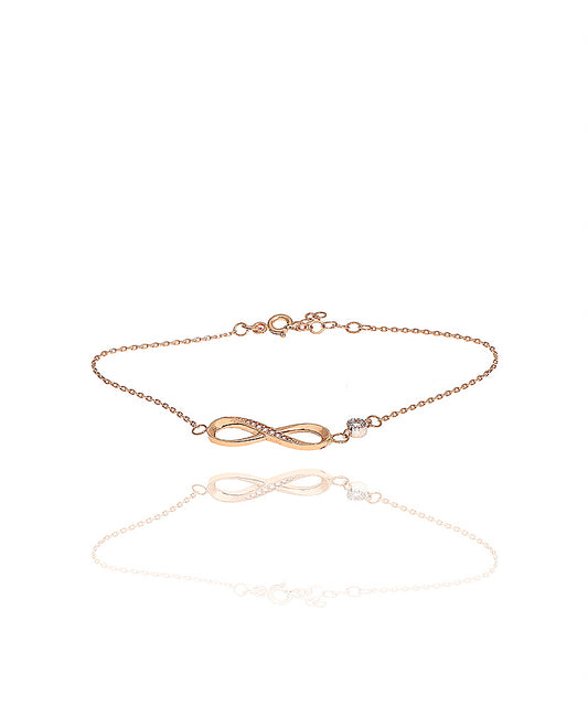 Auksinė apyrankė su begalybės simboliu ir cirkoniu