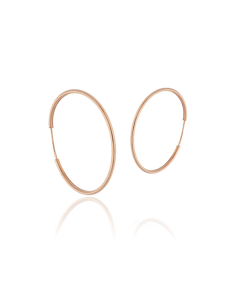 Auksinės auskarų rinkutės su išmatavimu iš šono