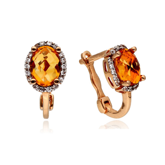 Auksiniai auskarai su oranžiniu akmeniu