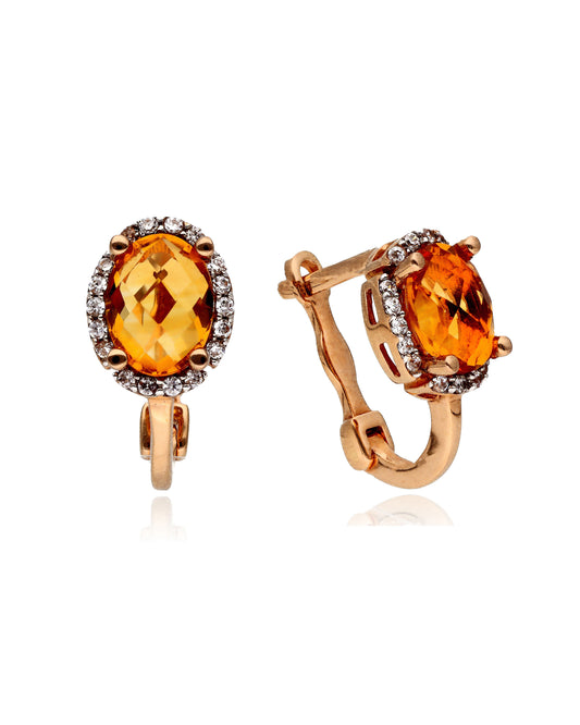 Auksiniai auskarai su oranžiniu akmeniu
