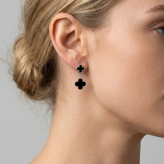 juodi kabantys auskarai