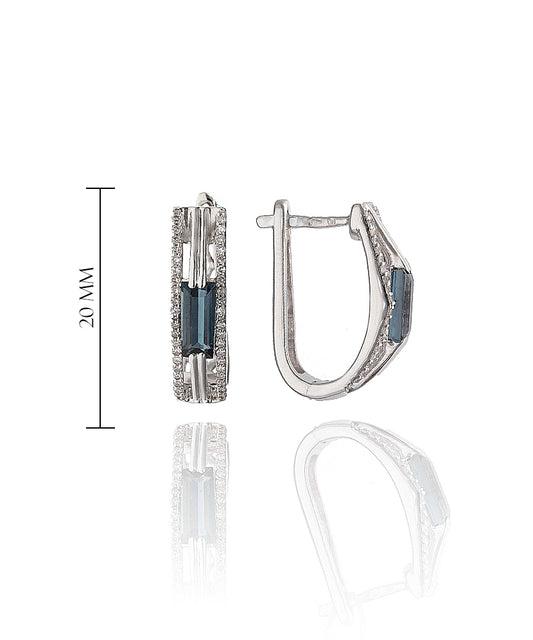 uskarai su mėlynu akmeniu ir briliantais – balto aukso korpusas, šoninė perspektyva