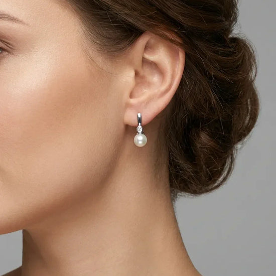 perliniai auskarai su sidabru