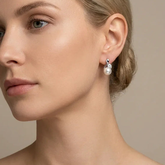 perliniai sidabriniai auskarai