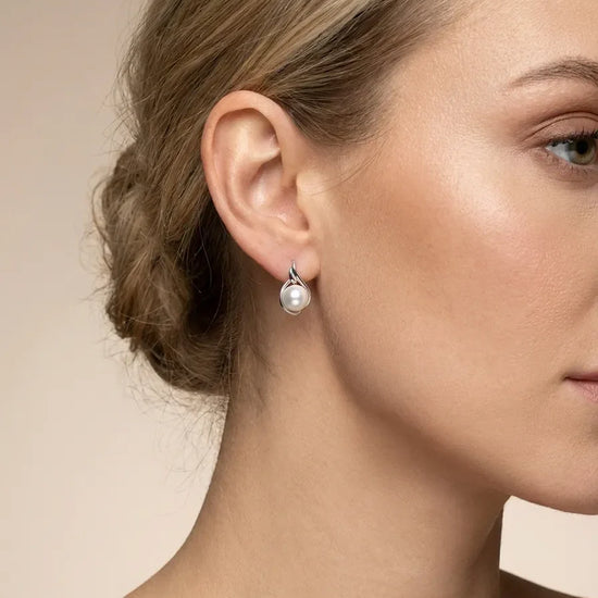 sidabriniai auskarai su perlais