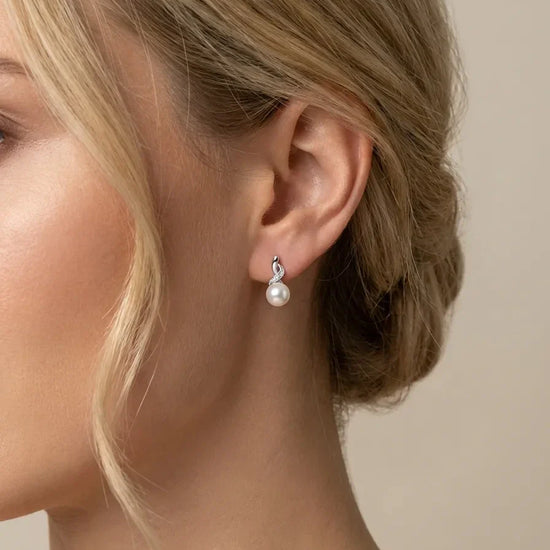 sidabriniai auskarai su perlais