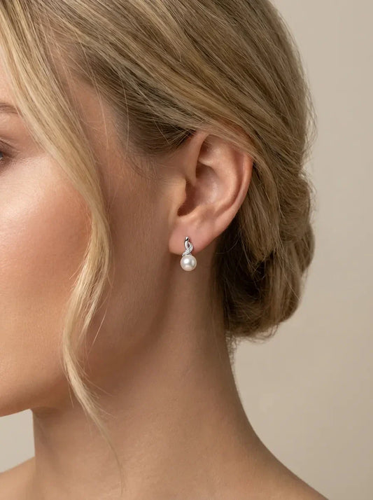 sidabriniai auskarai su perlais