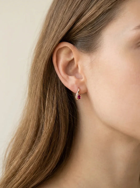 Gold earrings with rubies and diamonds