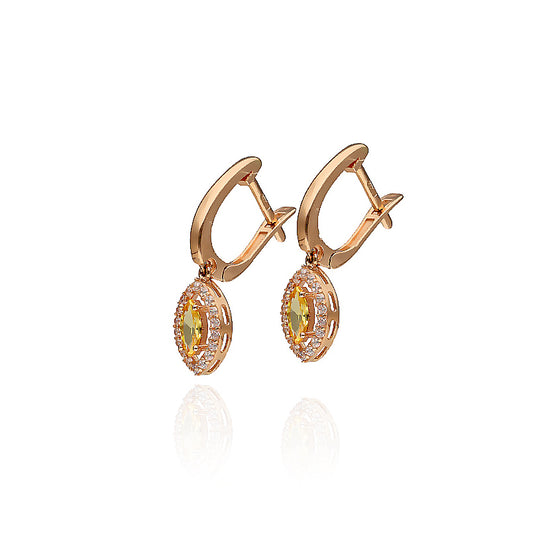 Auksiniai auskarai su kristalu