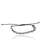 Juoda virvelinė apyrankė su širdelėmis ir 585 prabos auksu