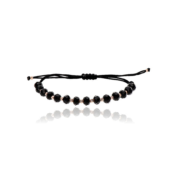 Juoda virvelinė apyrankė su auksu