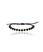 Juoda virvelinė apyrankė su auksu