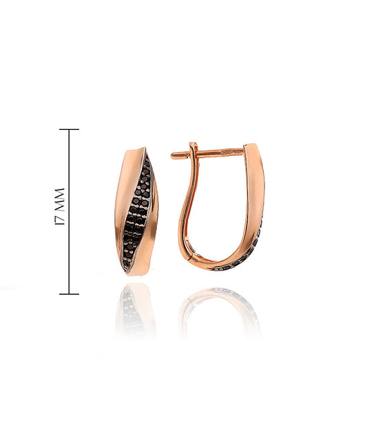 Siauri rožinio aukso auskarai su juodais akmenimis iš arti