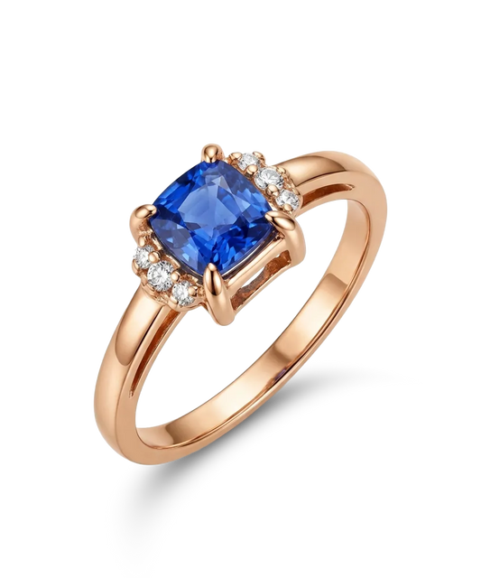 Rožinio aukso žiedas su mėlynu safyru ir briliantais