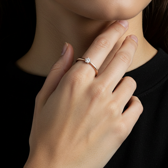 Rausvo aukso suzadetiu ziedas