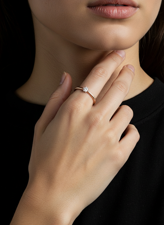 Rausvo aukso suzadetiu ziedas