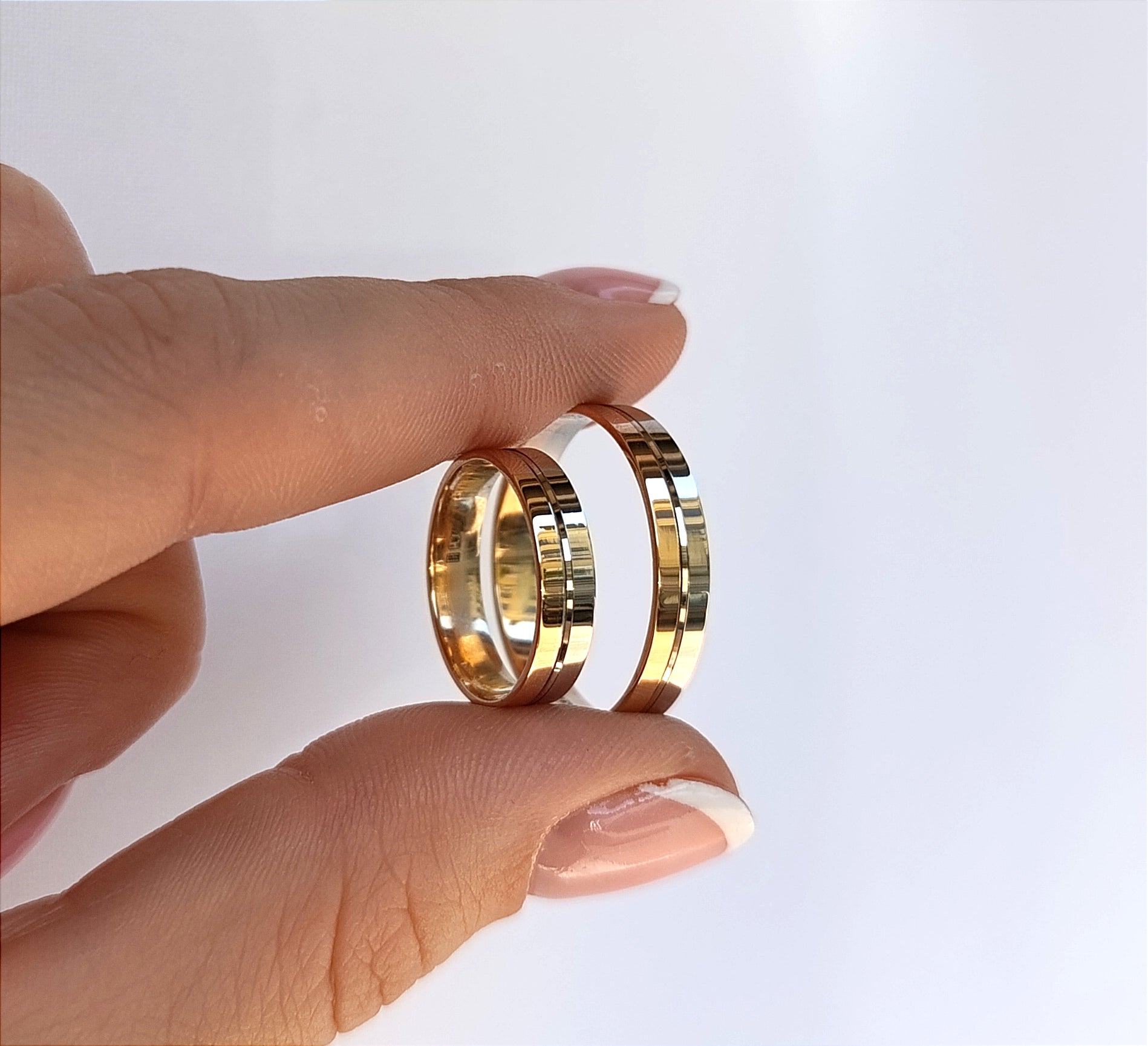 Vestuviniai žiedai, rožinis auksas 585, poliruotas paviršius, balto aukso takelis, 4,5 mm