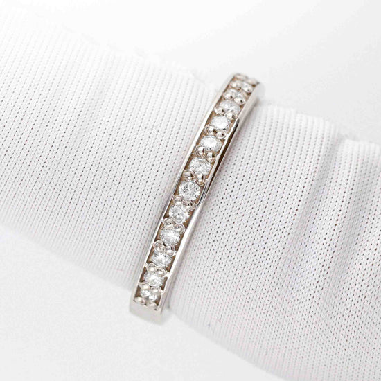 Vestuvinis žiedas su spindinčiomis akutėmis iš visų pusių