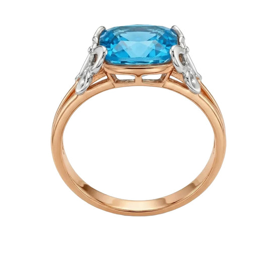 prabangus auksinis ziedas su melynu akmeniu