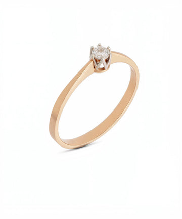 Raudono aukso žiedas su 0,16 ct deimantu